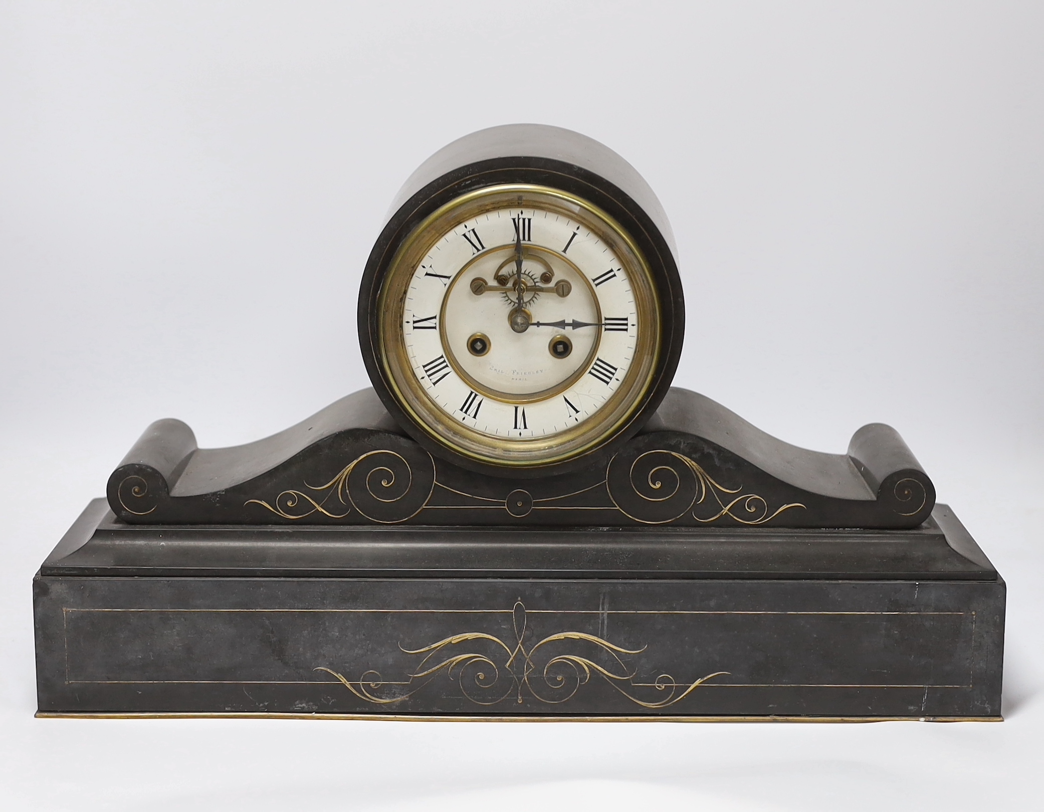 A 19th century French polished black slate mantel clock, 50cm wide